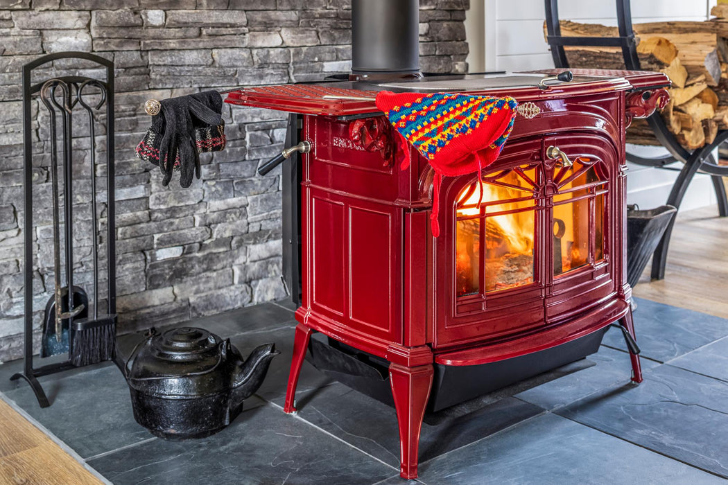 Vermont Castings Encore wood stove in Bordeaux enamel installed in a home
