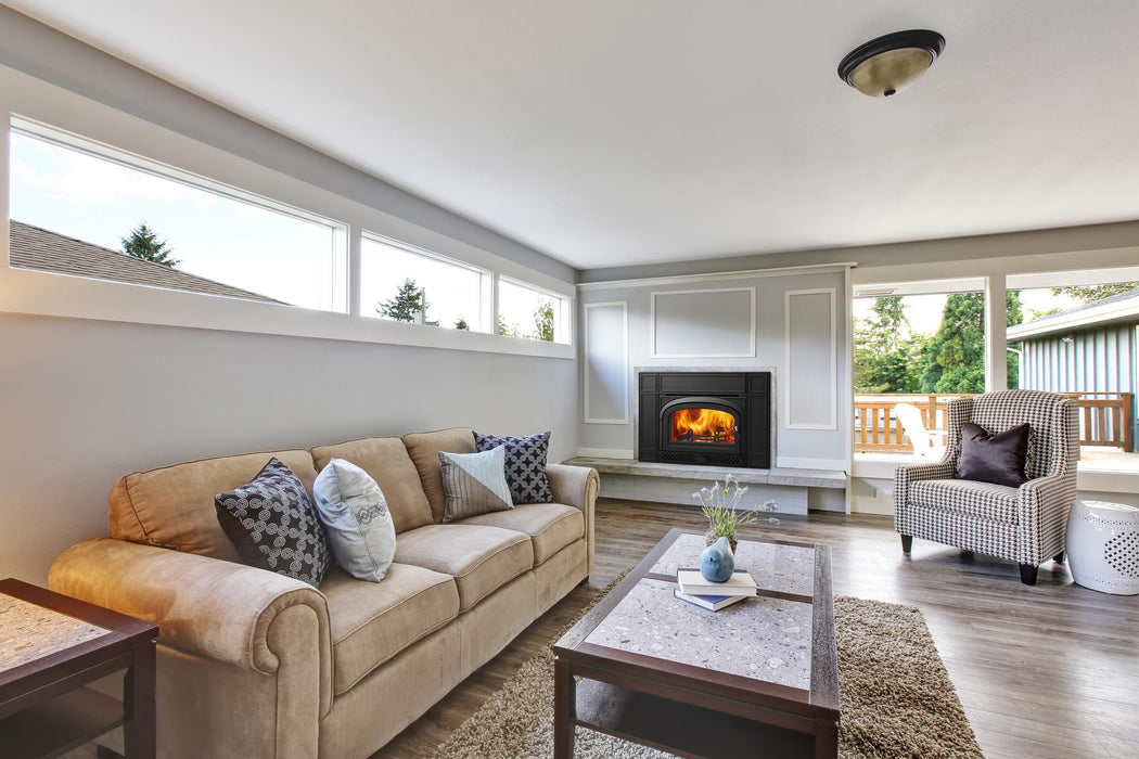 Vermont Castings Montpelier II insert in Classic Black installed in a masonry fireplace