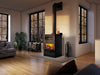 Osburn Gusto Cookstove (OB02047) in a bright living space with hardwood floors and log storage