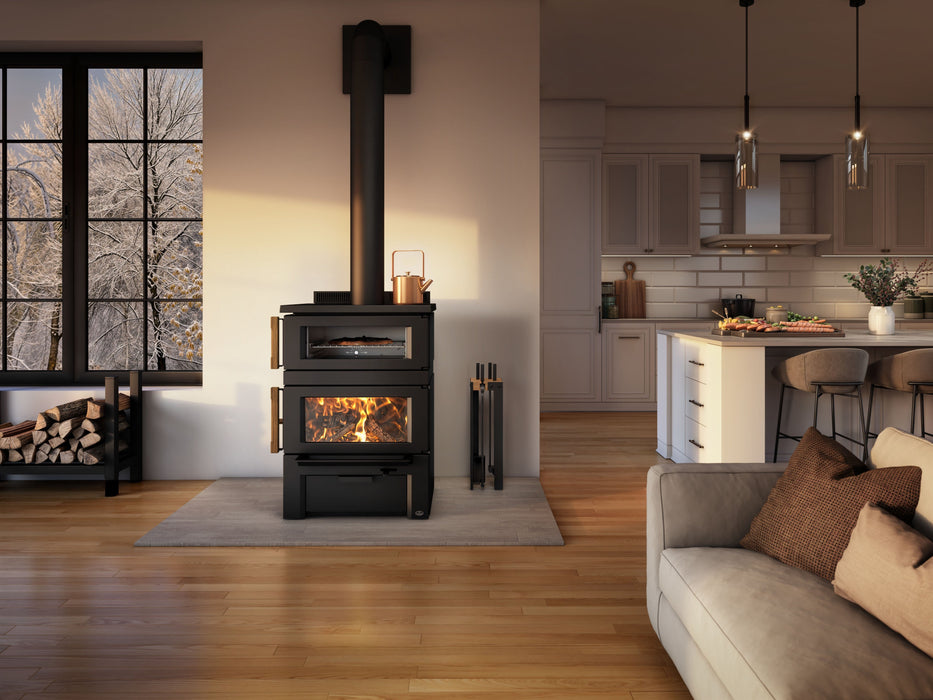 Osburn Gusto Wood Burning Cookstove (OB02047) installed in a farmhouse kitchen with fire burning behind the glass door